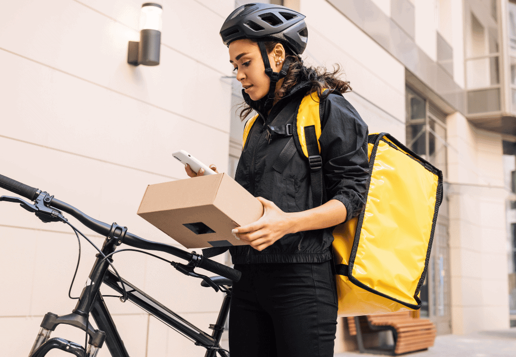 Delivery woman on a bike